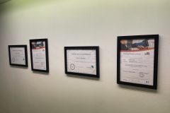 A picture showing Darren Rushby and Lily Greenway's business qualifications