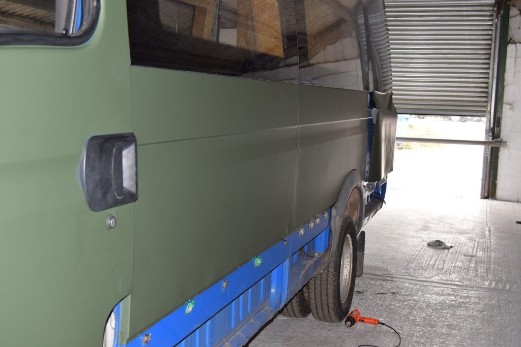 Iveco passenger door and side being wrapped