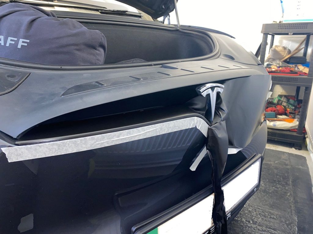 Tesla Model X SUV front grill dechrome in progress