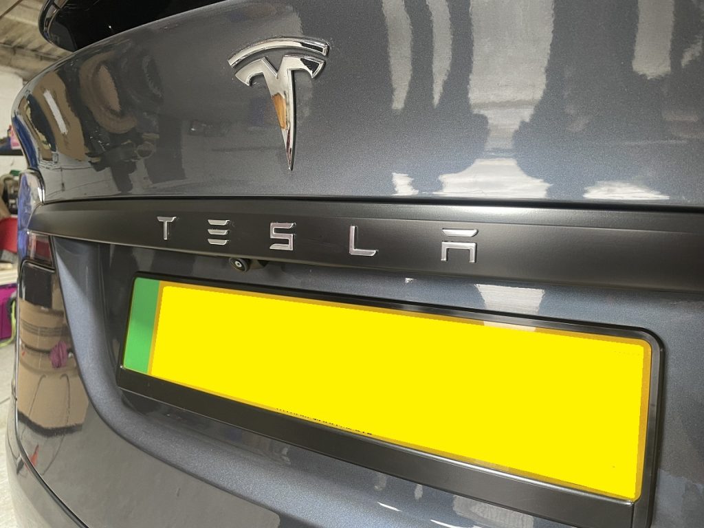 Tesla Model X SUV rear boot strip dechromed alternative angle